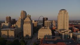 5.7K aerial stock footage of the famous Arch seen from the courthouses, reveal the museum at sunset, Downtown St. Louis, Missouri Aerial Stock Footage | DX0001_000848