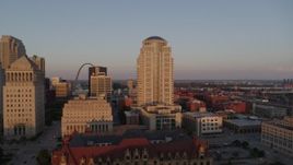 5.7K aerial stock footage of courthouse buildings, revealing the Arch at sunset, Downtown St. Louis, Missouri Aerial Stock Footage | DX0001_000860