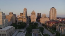 5.7K aerial stock footage of a reverse view of downtown courthouse buildings at sunset, Downtown St. Louis, Missouri Aerial Stock Footage | DX0001_000861