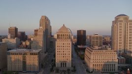 5.7K aerial stock footage approach downtown courthouse and ascend to reveal Arch at sunset, Downtown St. Louis, Missouri Aerial Stock Footage | DX0001_000862