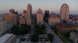 5.7K aerial stock footage of the Gateway Arch and downtown courthouses at sunset, Downtown St. Louis, Missouri Aerial Stock Footage | DX0001_000872