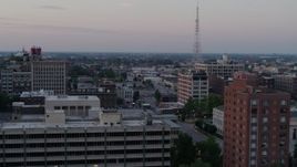 5.7K aerial stock footage flyby brick office building for a wider view of neighborhood at twilight, Downtown St. Louis, Missouri Aerial Stock Footage | DX0001_000879