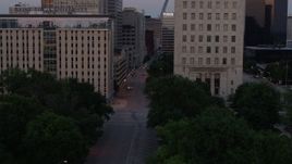 5.7K aerial stock footage flyby university, city streets and courthouse at twilight, Downtown St. Louis, Missouri Aerial Stock Footage | DX0001_000885