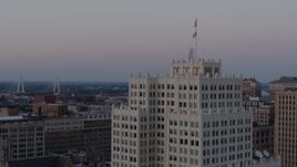 5.7K aerial stock footage of orbiting the top of a downtown apartment building at twilight, Downtown St. Louis, Missouri Aerial Stock Footage | DX0001_000887