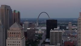 5.7K aerial stock footage of the Gateway Arch at twilight seen across Downtown St. Louis, Missouri Aerial Stock Footage | DX0001_000891