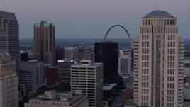 5.7K aerial stock footage flyby courthouse skyscraper and reveal the Gateway Arch at twilight in Downtown St. Louis, Missouri Aerial Stock Footage | DX0001_000892