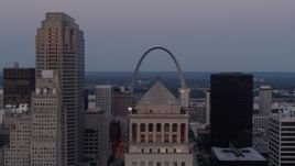 5.7K aerial stock footage of the Gateway Arch at twilight, visible from a courthouse in Downtown St. Louis, Missouri Aerial Stock Footage | DX0001_000893