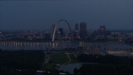 5.7K aerial stock footage of the Gateway Arch at twilight, visible from across the Mississippi River, Downtown St. Louis, Missouri Aerial Stock Footage | DX0001_000895