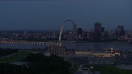 5.7K aerial stock footage of the famous Gateway Arch at twilight, visible from across the Mississippi River, Downtown St. Louis, Missouri Aerial Stock Footage | DX0001_000896