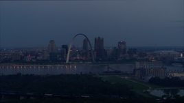 5.7K aerial stock footage a view of the Gateway Arch and the Mississippi River at twilight, Downtown St. Louis, Missouri Aerial Stock Footage | DX0001_000900
