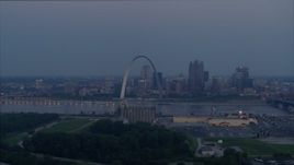 5.7K aerial stock footage looking across the Mississippi River at the Gateway Arch, Downtown St. Louis, Missouri, twilight Aerial Stock Footage | DX0001_000903