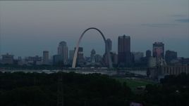 5.7K aerial stock footage of the Gateway Arch and the skyline of Downtown St. Louis, Missouri, at twilight while ascending Aerial Stock Footage | DX0001_000920