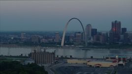 5.7K aerial stock footage of the Gateway Arch in Downtown St. Louis, Missouri, across the Mississippi River at sunrise Aerial Stock Footage | DX0001_000922