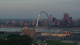 5.7K aerial stock footage of sunlight on the St. Louis Arch by the Mississippi River at sunrise in Downtown St. Louis, Missouri Aerial Stock Footage | DX0001_000940