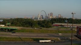 5.7K aerial stock footage ascend from light traffic on I-55 for view of the Gateway Arch at sunrise, Downtown St. Louis, Missouri Aerial Stock Footage | DX0001_000970