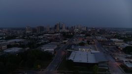 5.7K aerial stock footage of the distant city skyline at twilight in Downtown Kansas City, Missouri Aerial Stock Footage | DX0001_000973