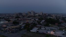 5.7K aerial stock footage of passing by the city skyline at twilight in Downtown Kansas City, Missouri Aerial Stock Footage | DX0001_000975
