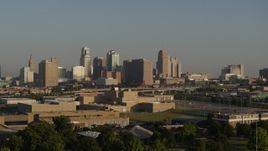 5.7K aerial stock footage of a slow approach to the downtown skyline at sunrise, Downtown Kansas City, Missouri Aerial Stock Footage | DX0001_001023