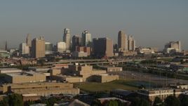 5.7K aerial stock footage flyby the downtown skyline at sunrise, seen from tech school in Downtown Kansas City, Missouri Aerial Stock Footage | DX0001_001026