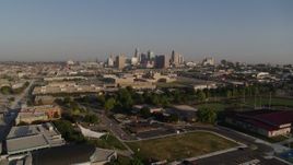 5.7K aerial stock footage of flying over a community center to approach skyline of Downtown Kansas City, Missouri Aerial Stock Footage | DX0001_001033