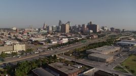 5.7K aerial stock footage a view of the city skyline of Downtown Kansas City, Missouri from freeway Aerial Stock Footage | DX0001_001037