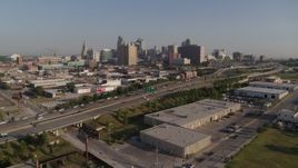 5.7K aerial stock footage flyby a freeway east of city office buildings in Downtown Kansas City, Missouri Aerial Stock Footage | DX0001_001038
