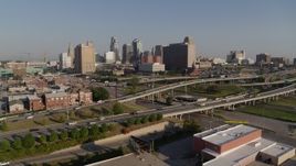 5.7K aerial stock footage flyby a freeway east of city office buildings to interchange in Downtown Kansas City, Missouri Aerial Stock Footage | DX0001_001039