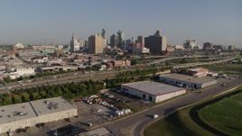5.7K aerial stock footage approach freeway and city skyline in Downtown Kansas City, Missouri Aerial Stock Footage | DX0001_001042