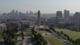 5.7K aerial stock footage orbit the WWI memorial in Kansas City, Missouri, with a view of the downtown skyline Aerial Stock Footage | DX0001_001068