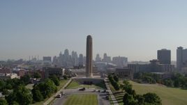 5.7K aerial stock footage ascend to approach the WWI memorial in Kansas City, Missouri, with a view of the downtown skyline Aerial Stock Footage | DX0001_001070