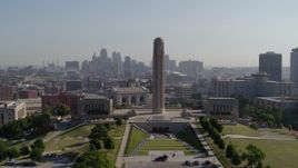 5.7K aerial stock footage reverse view of the WWI memorial in Kansas City, Missouri, and the downtown skyline Aerial Stock Footage | DX0001_001072