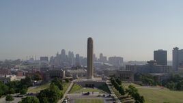 5.7K aerial stock footage fly away from the WWI memorial and skyline in Kansas City, Missouri, and descend Aerial Stock Footage | DX0001_001074