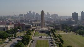 5.7K aerial stock footage a static view of the WWI memorial and skyline in Kansas City, Missouri, then descend Aerial Stock Footage | DX0001_001082