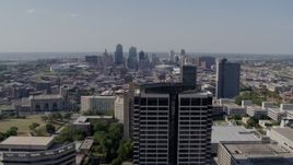 5.7K aerial stock footage of the city skyline seen from Crown Center, Downtown Kansas City, Missouri Aerial Stock Footage | DX0001_001083