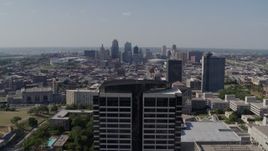 5.7K aerial stock footage slow approach to skyline behind Crown Center office building, Downtown Kansas City, Missouri Aerial Stock Footage | DX0001_001089