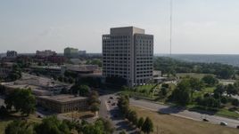 5.7K aerial stock footage fly away from a government office building and descend, Kansas City, Missouri Aerial Stock Footage | DX0001_001101