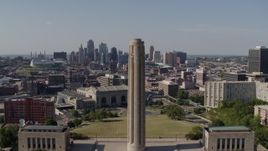 5.7K aerial stock footage approach the WWI memorial and the Downtown Kansas City, Missouri skyline Aerial Stock Footage | DX0001_001108