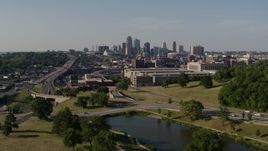 5.7K aerial stock footage descend with view of a government office building and city's skyline, Downtown Kansas City, Missouri Aerial Stock Footage | DX0001_001128
