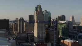 5.7K aerial stock footage of descending by city skyscraper and crane in Downtown Kansas City, Missouri Aerial Stock Footage | DX0001_001160