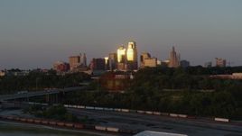 5.7K aerial stock footage of the skyline at sunset seen from west of the city, Downtown Kansas City, Missouri Aerial Stock Footage | DX0001_001169