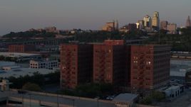 5.7K aerial stock footage circle around a brick office building at twilight in Kansas City, Missouri Aerial Stock Footage | DX0001_001174