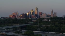 5.7K aerial stock footage of city skyscrapers reflecting the light of the twilight in Downtown Kansas City, Missouri Aerial Stock Footage | DX0001_001175