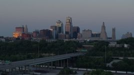 5.7K aerial stock footage flyby city skyline at twilight, seen from I-670, Downtown Kansas City, Missouri Aerial Stock Footage | DX0001_001188