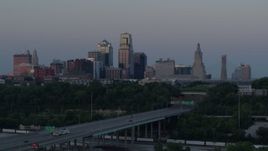 5.7K aerial stock footage static view and flyby of city skyline at twilight, seen from I-670, Downtown Kansas City, Missouri Aerial Stock Footage | DX0001_001189