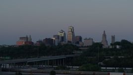 5.7K aerial stock footage flyby brick building to reveal skyline at twilight, Downtown Kansas City, Missouri Aerial Stock Footage | DX0001_001195