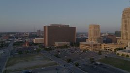 5.7K aerial stock footage fly away from a government building at sunrise, Downtown Kansas City, Missouri Aerial Stock Footage | DX0001_001207