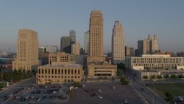 5.7K aerial stock footage passing city hall and skyscraper at sunrise, Downtown Kansas City, Missouri Aerial Stock Footage | DX0001_001210