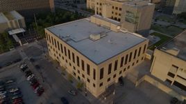 5.7K aerial stock footage of approaching police station at sunrise, Downtown Kansas City, Missouri Aerial Stock Footage | DX0001_001213