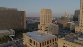 5.7K aerial stock footage approach police station at sunrise, focus on courthouse, Downtown Kansas City, Missouri Aerial Stock Footage | DX0001_001215