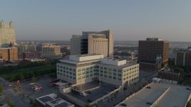 5.7K aerial stock footage approach government offices and federal courthouse at sunrise, Downtown Kansas City, Missouri Aerial Stock Footage | DX0001_001218